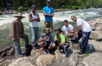 America's Great Outdoors-group on rocks at Ocoee River